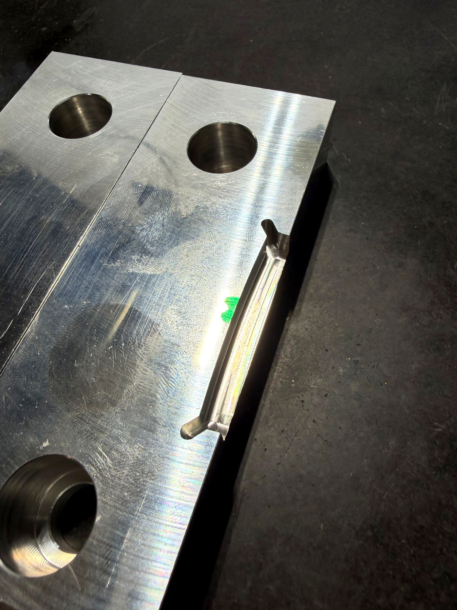 Machined steel plate with bores